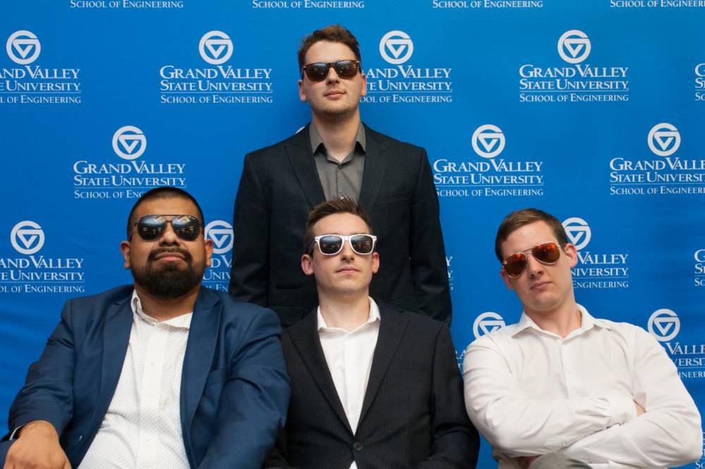 Student team wearing sunglasses